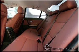 Перетяжка салона кожей BMW E90