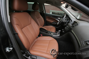 Перетяжка салона коричневой кожей Opel Insignia
